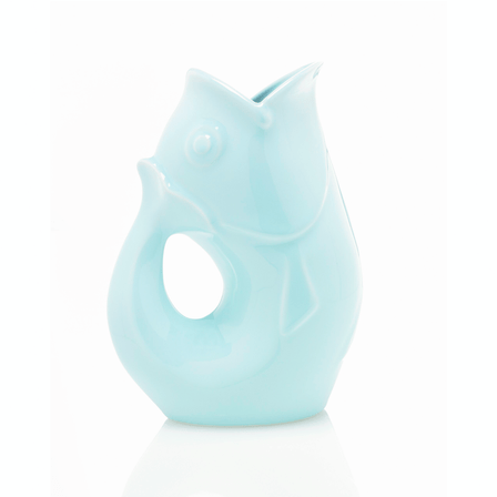 Pastel blue fish shaped water vase with a handle.