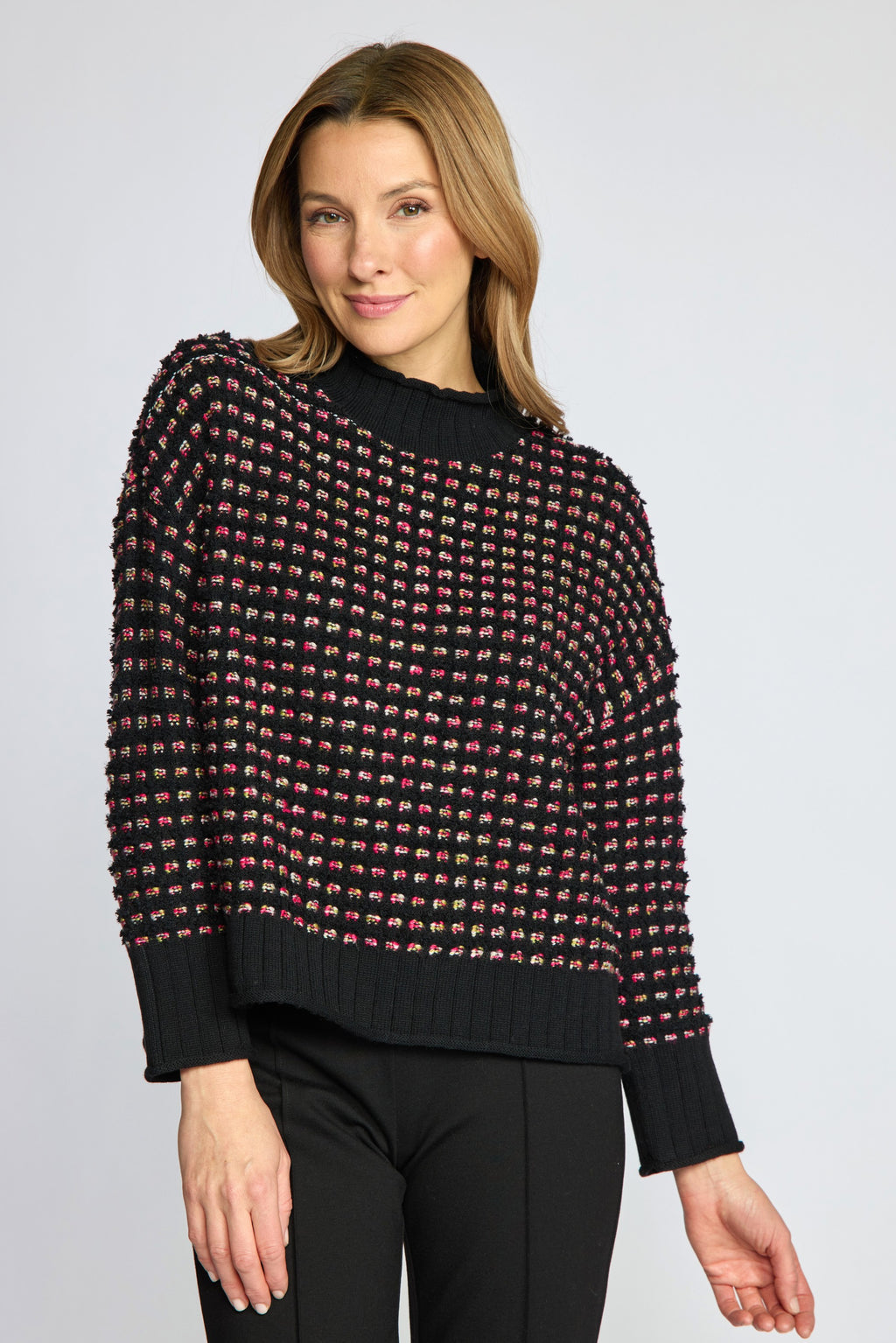 Olivia by Habitat's Velura Knit Funnel Neck Sweater in Black