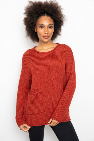 Liv by Habitat Cozy Chunky Knit Sweater in Brick. Oversized fit, long sleeves, patch pocket at hip, rolled hems.
