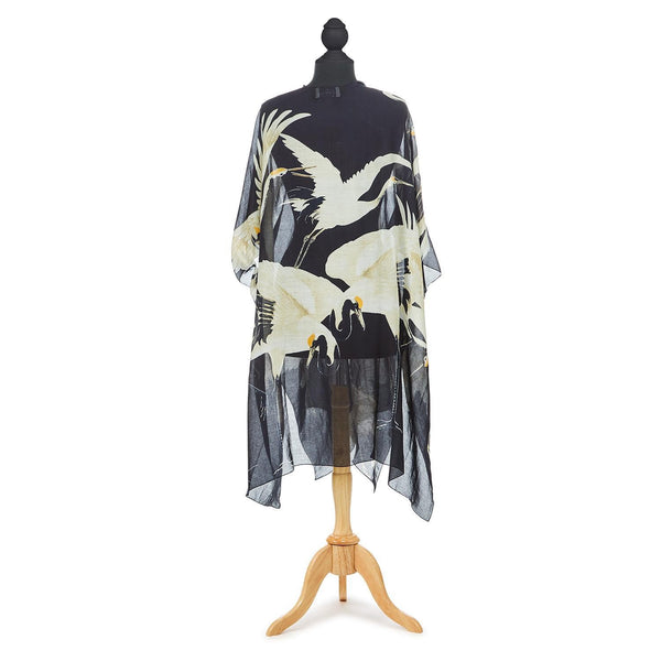 Black Long Kimono with white heron print throughout.  Sleeveless, knee length, open front, sheer fabric.