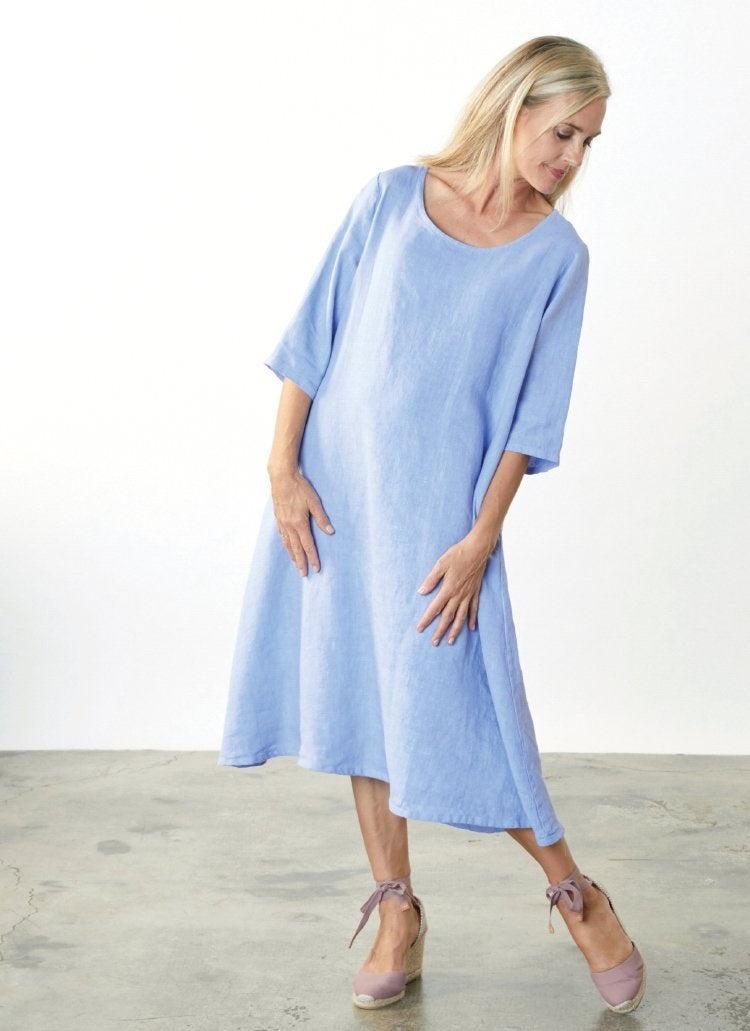 Brynn Walker Homer Linen Dress. Mid length, round neckline, 3/4 length sleeves, a-line silhouette.