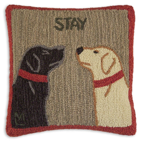 Hooked wool accent pillow. Brown with red border. Features a black and yellow lab with the word "Stay" centered above their heads.