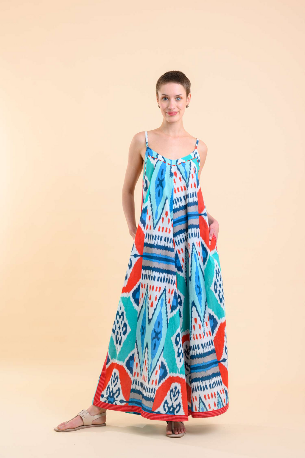 Dream Apparel's Rio Jumpsuit in Red Teal Ikat