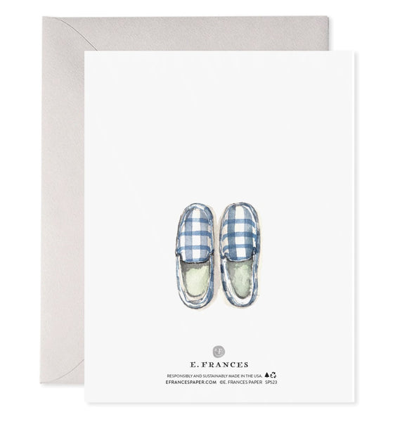 The back of the card features a watercolor picture of blue and white checked slippers