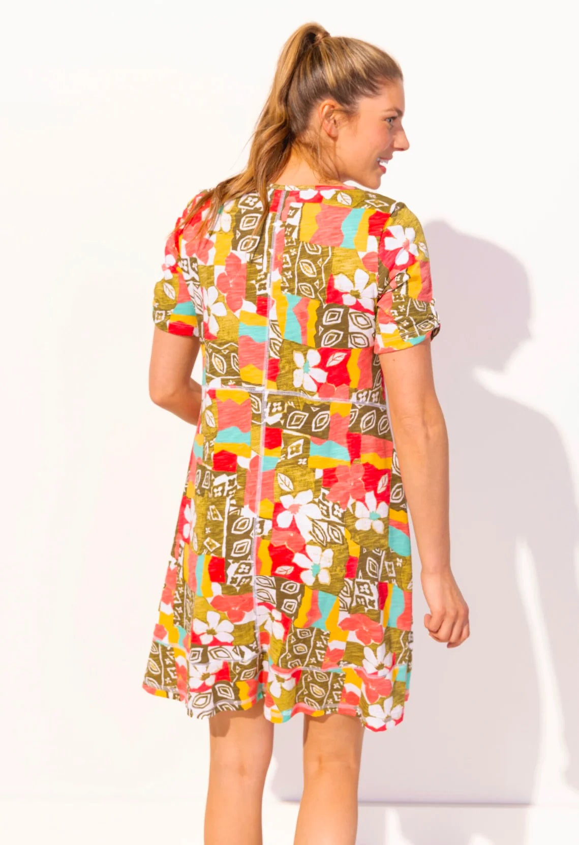 The Island Hand Block Bistro Dress from Escape in Coral