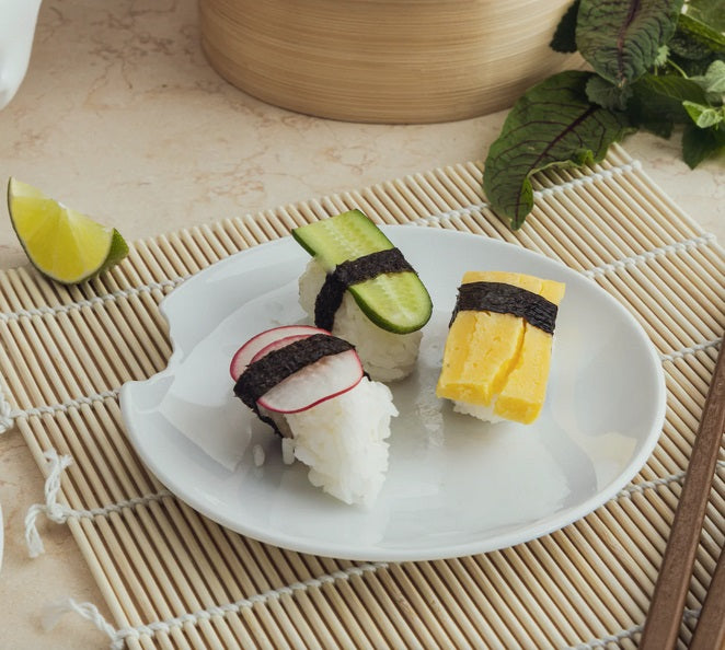 Tiny Porcelain Plate with Bite Marks