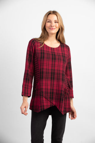 Habitat Asymmetrical Tunic in Cranberry. Contrasting red and black plaid panels, crossover asymmetrical hem in front, round neck, long sleeves, pockets.