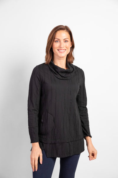 Habitat Steady Stream Pocket Tunic in black.  Texturally pleated fabric, cowl neck, long sleeves, angled front pocket with button detail and pleated notched hem.