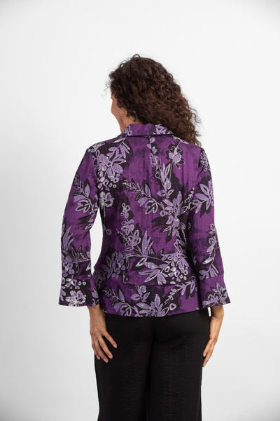 Habitat Floral Flounce Top in Damson purple floral pattern. Long sleeves, button front, tiered layers.