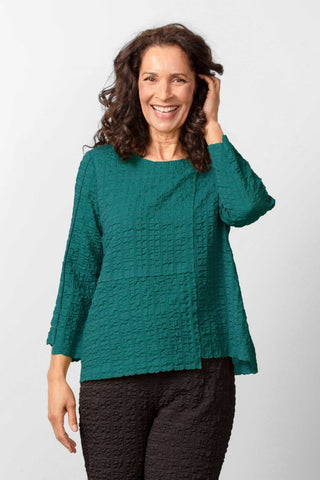 Habitat Pucker Weave Pullover in teal.  Boxy shape, pucker textured fabric, exposed seam details, bracelet length sleeves, round neckline.
