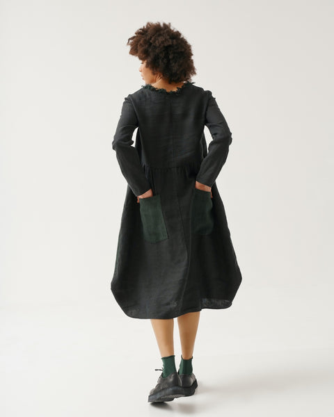 Kedziorek Linen Empire Waist Dress. Midi Length, Long Sleeves, Dark Green. Back Pockets.