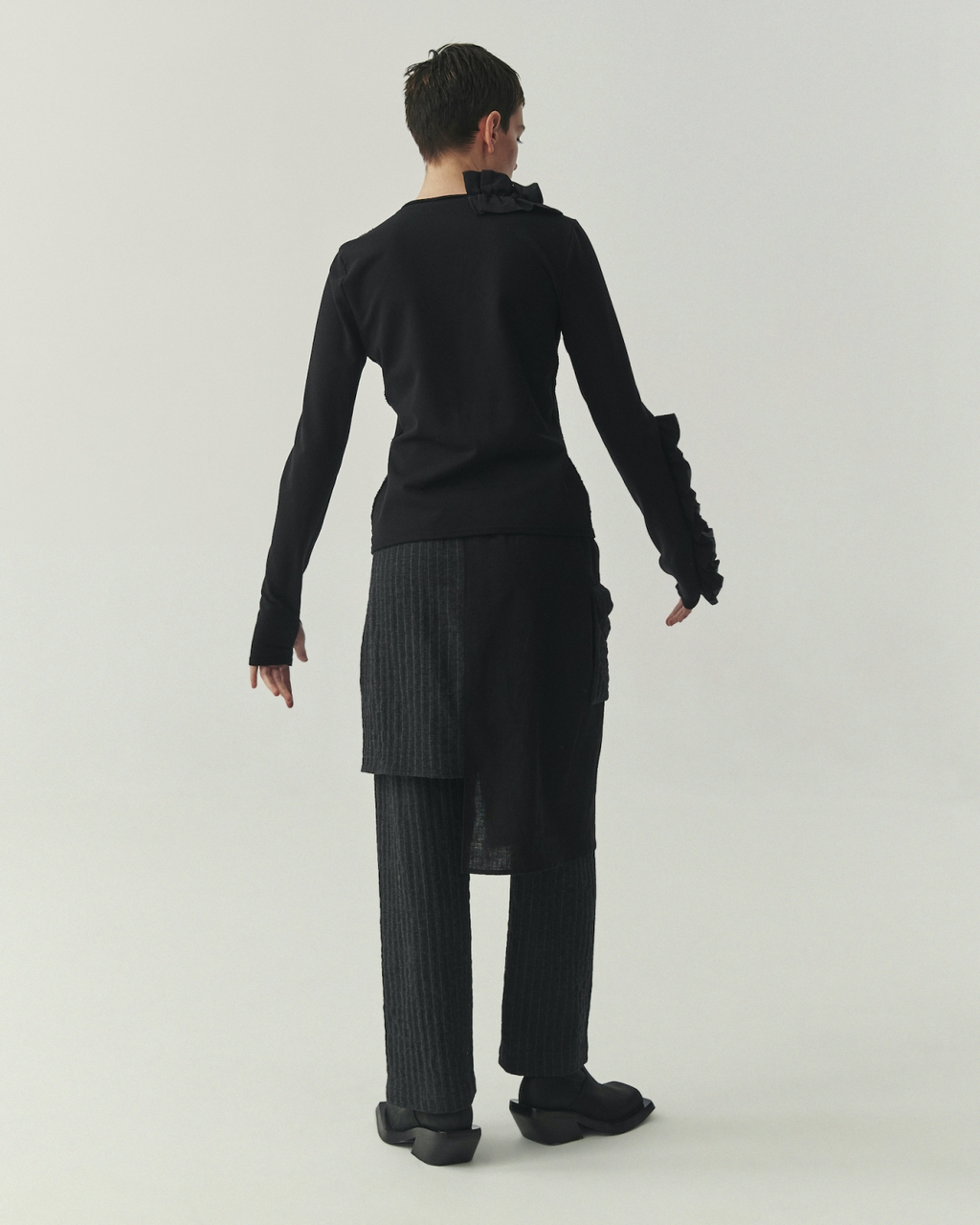 Kedziorek's Ruffle V-Neck Top