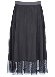 Kozan Mid Length Asia Skirt. Black mesh layered over solid fabric panel. A-line silhouette and elastic waist.