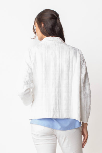 Liv by Habitat Short Quilted Jacket in White. Long sleeve, snap front and slightly cropped length with modern quilting texture. Fully lined.