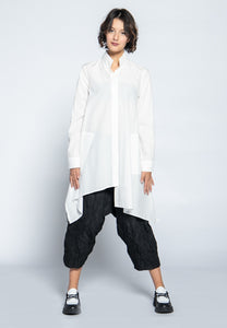 Luukaa Basics Shirt. Tunic length, button up, long sleeve, patch pocket, asymmetrical hem.