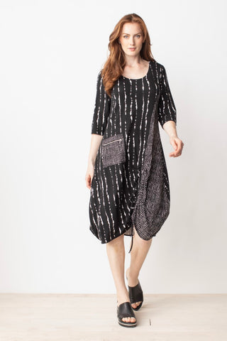 Liv by Habitat Ruched Mix Pattern Dress. Black with white mixed patterns, patch pocket with zipper detail and adjustable drawstring at front hemline. Round neck, half sleeves.