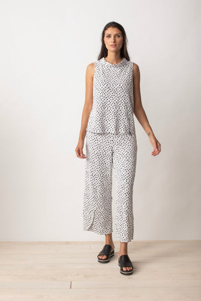 Liv by Habitat Speckled Dot Swing Tank Top. White and black dots sleeveless top with high round neck collar, a-line silhouette, zipper detail at side.