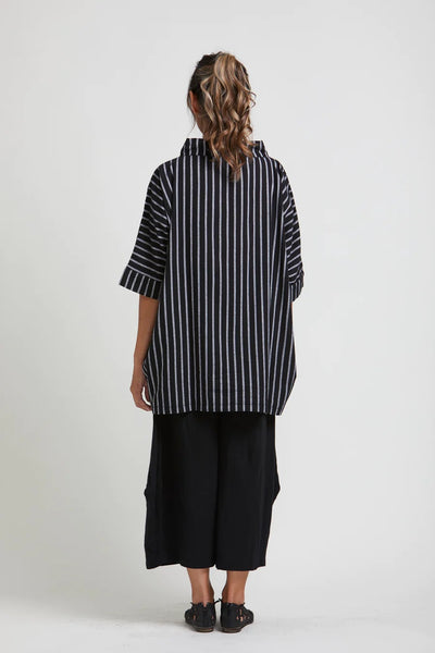 mSquared Clothing Nyla Top. Black with white pinstriping, wide mock neck, tunic length and half length sleeves.