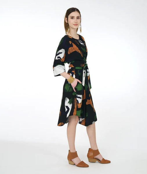 Niche Waterfall Dress. Black with white, green and brown abstract floral print. Round neckline, wide cropped sleeves, tie front waist, knee length.