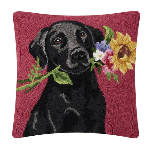 Hooked wool pillow. Red with black lab holding flowers in its mouth.