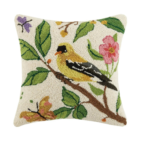 Hooked Wool Pillow with goldfinch sitting atop a flowering tree branch.