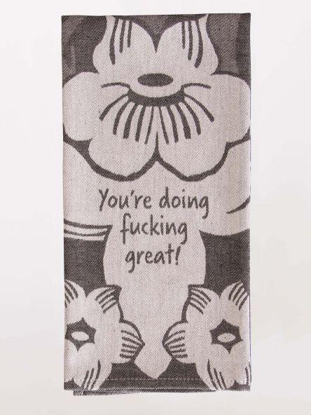Stone gray dish towel with white floral illustrations. Contains the text, "You're doing f-ing great!"