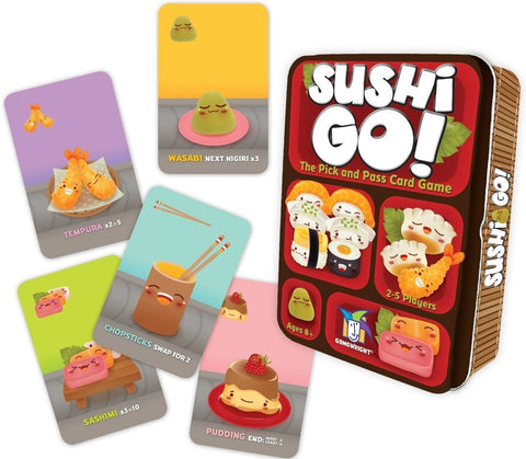 Red tin box resembling a Japanese bento lunch box. Tin has illustrations of Japanese food with cute faces. Displayed are several cards of Japanese food with cute faces.