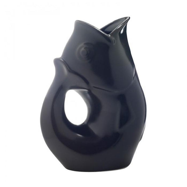 Black fish shaped water vase with a handle.