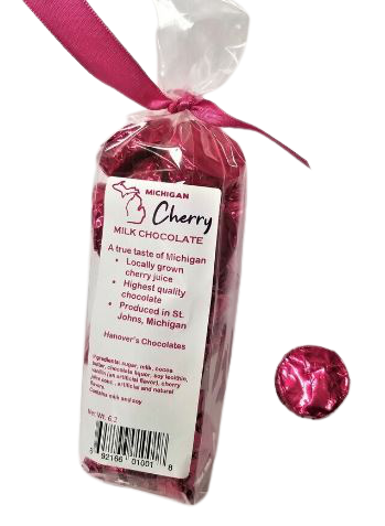 Plastic bag filled with cherry flavored chocolate. Tied with a red-magenta ribbon.