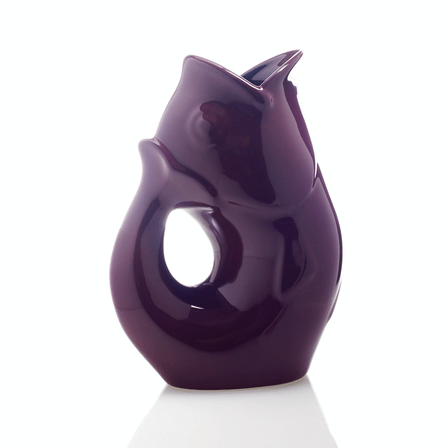 Merlot purple fish shaped water vase with a handle.