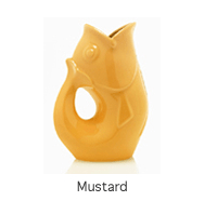 Mustard yellow fish shaped water vase with a handle.