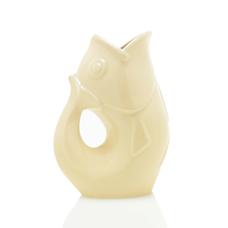 Cream white fish shaped water vase with a handle.