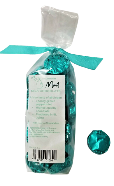 Plastic bag filled with mint flavored chocolate. Tied with a cyan ribbon.